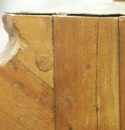 Previous repair, uncoloured and proud