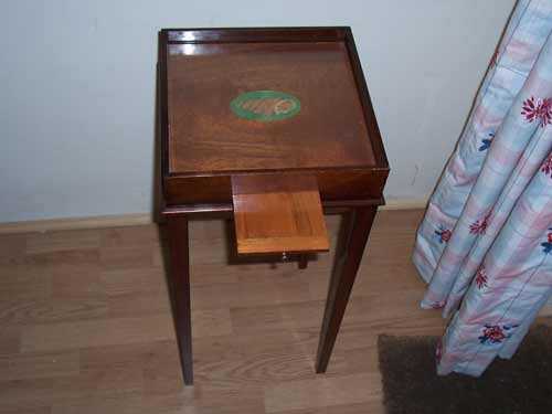 Urn stand with teapot tray extended